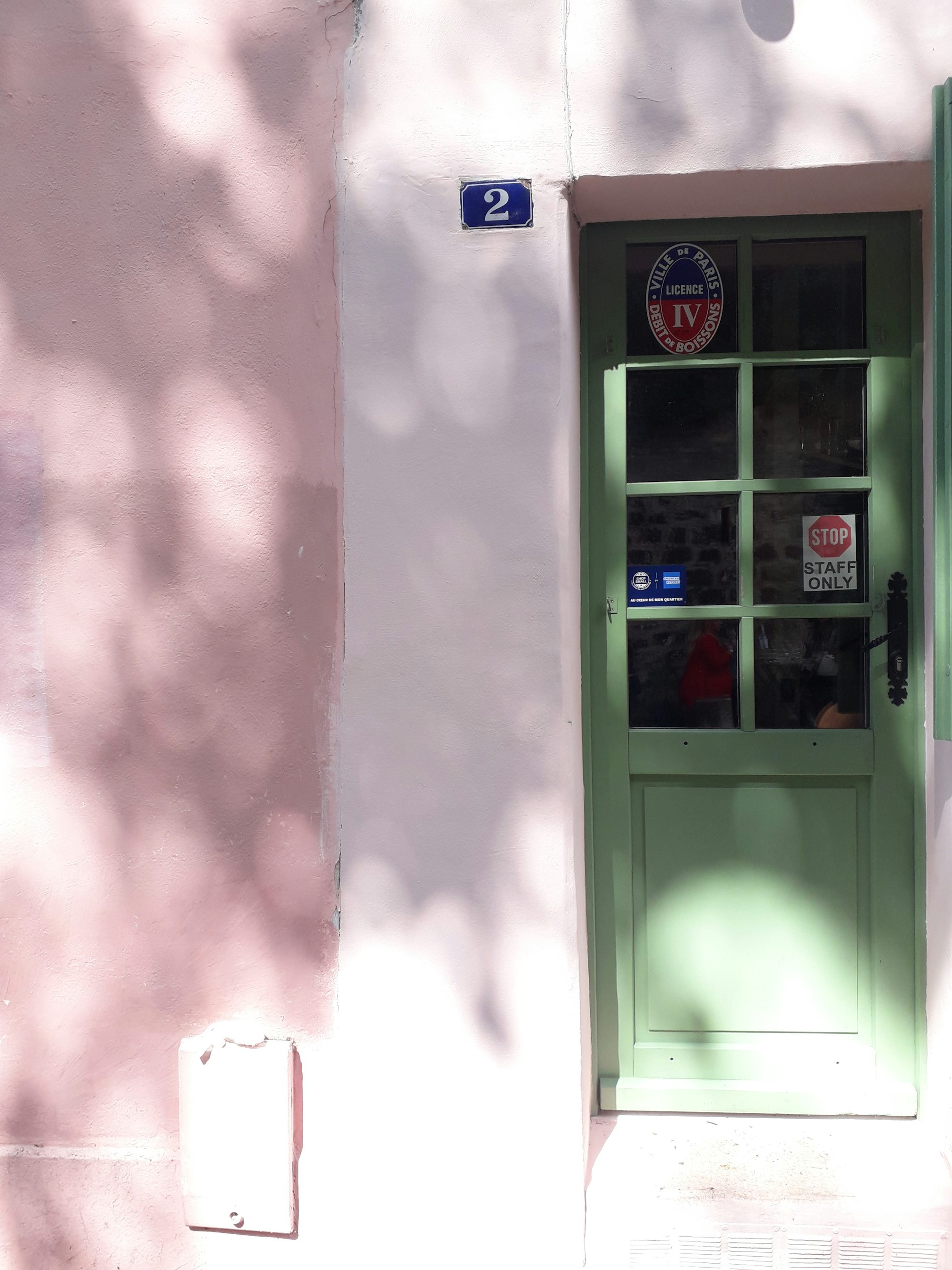 white wooden framed glass door